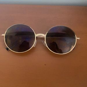 Gold rim sunglasses